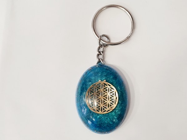 porte clé orgonite oval fleur arbre de vie